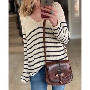 Blue and white striped sweater